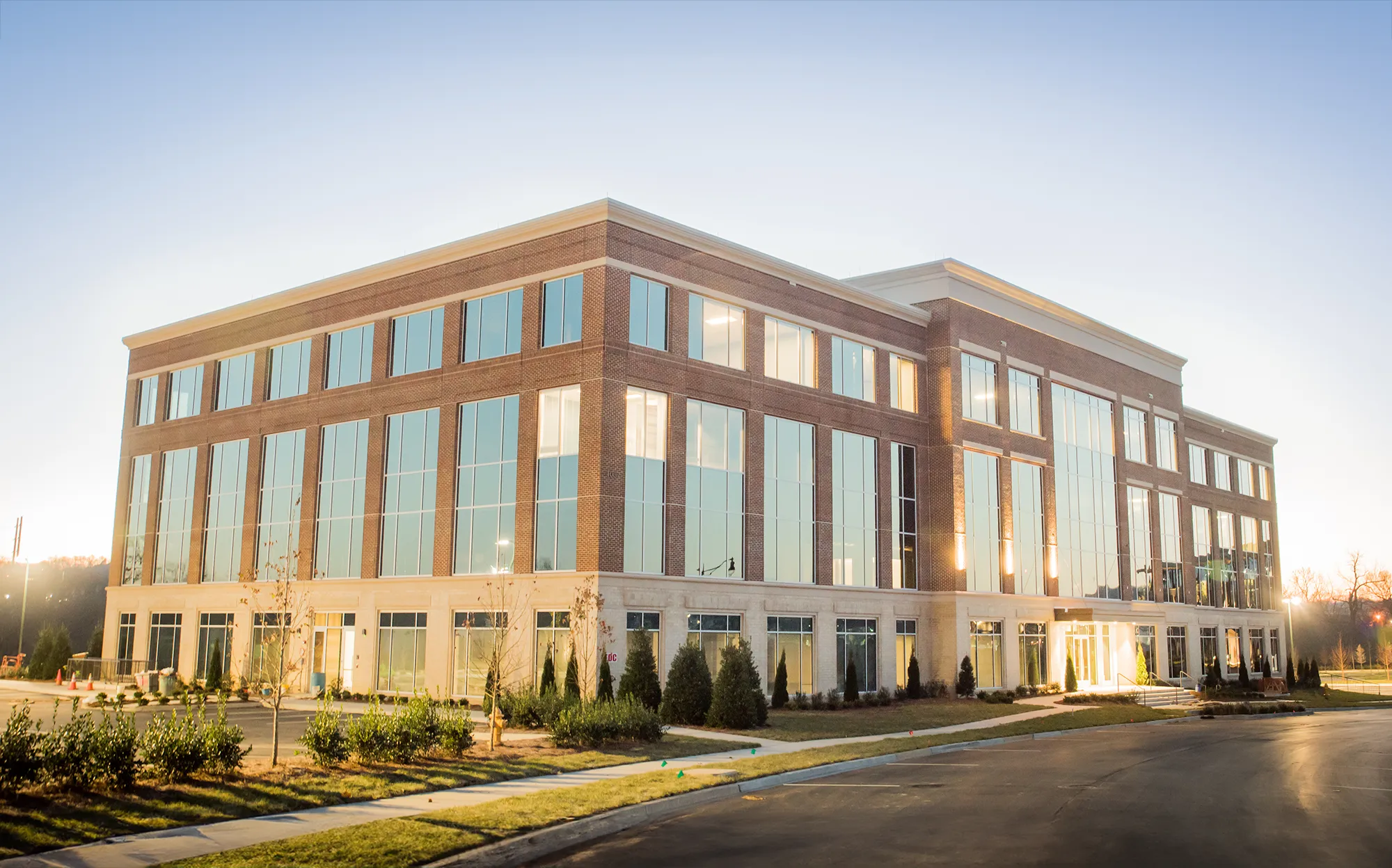 Front view of four-story office building at Berry Farms in Franklin, TN, a milestone project built by Bock Construction.