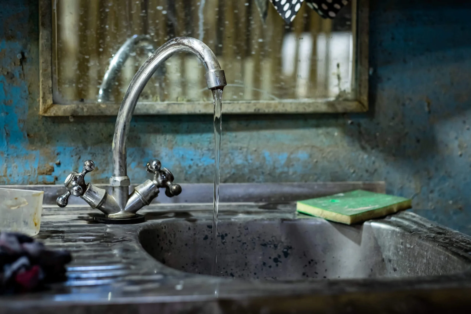 Rusty water in sink basin