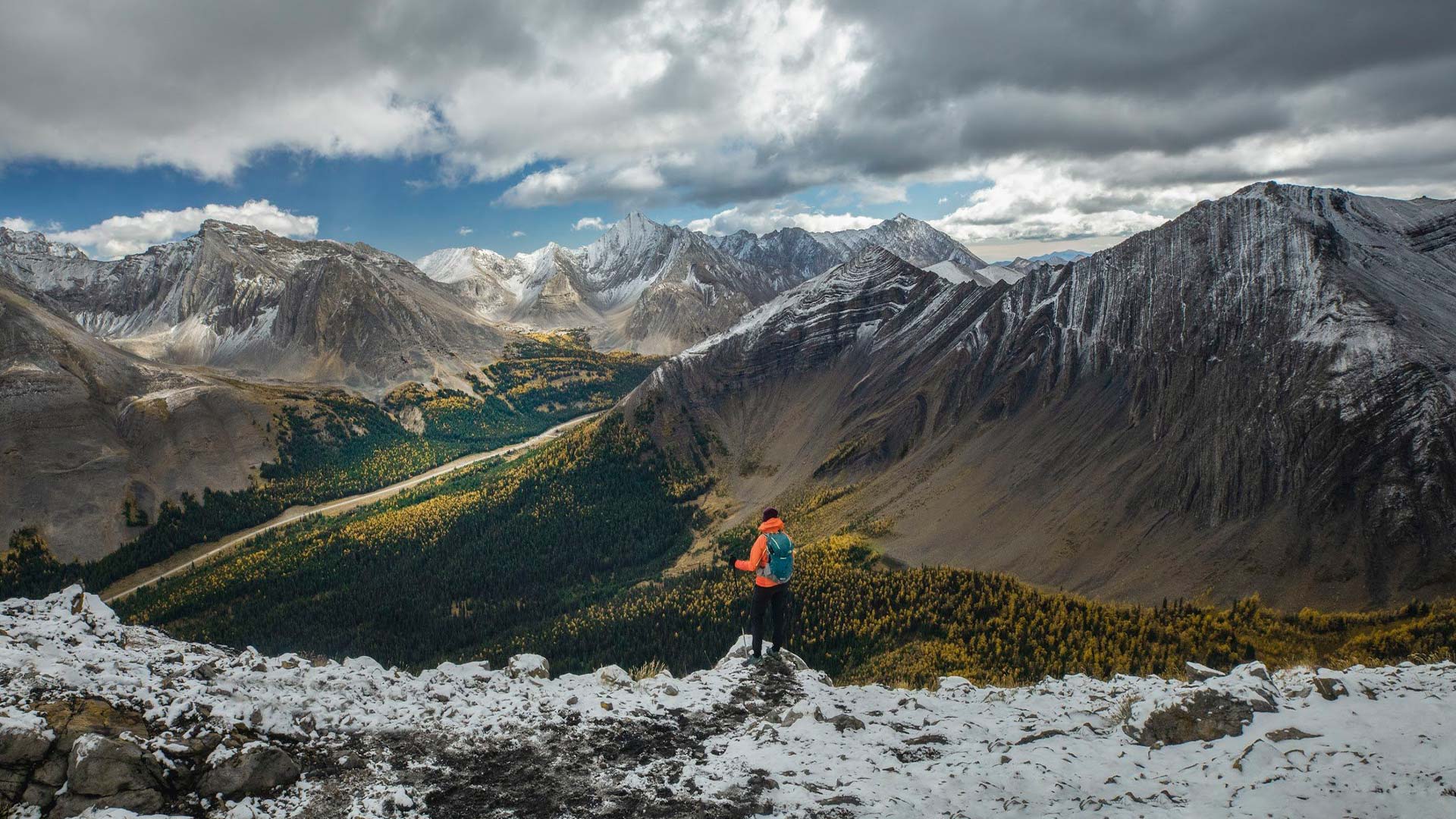 man hiking in a mountain range