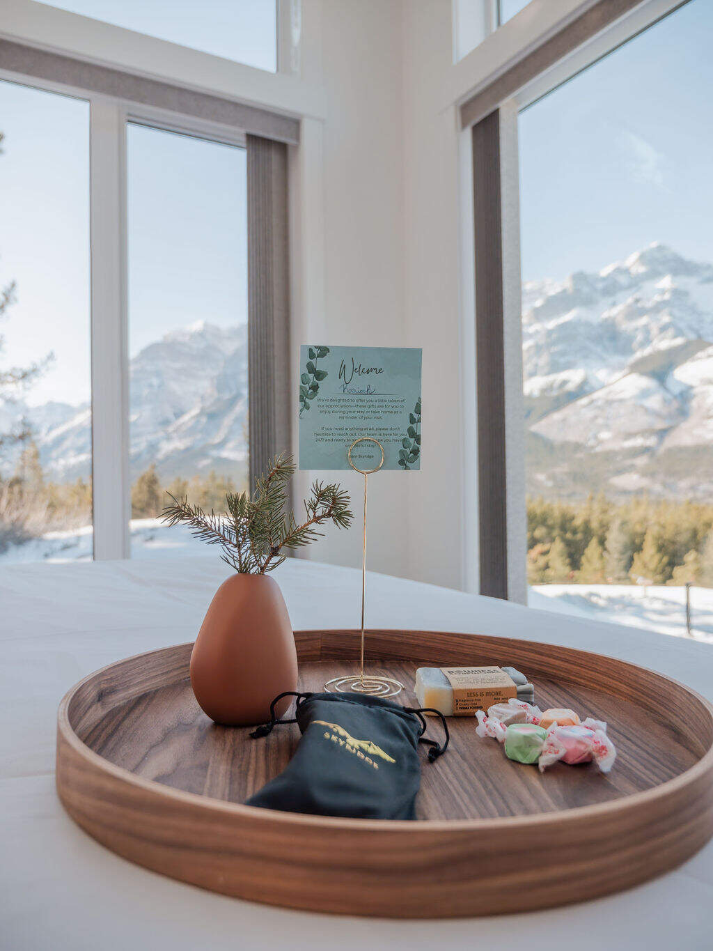 welcome package on a bed