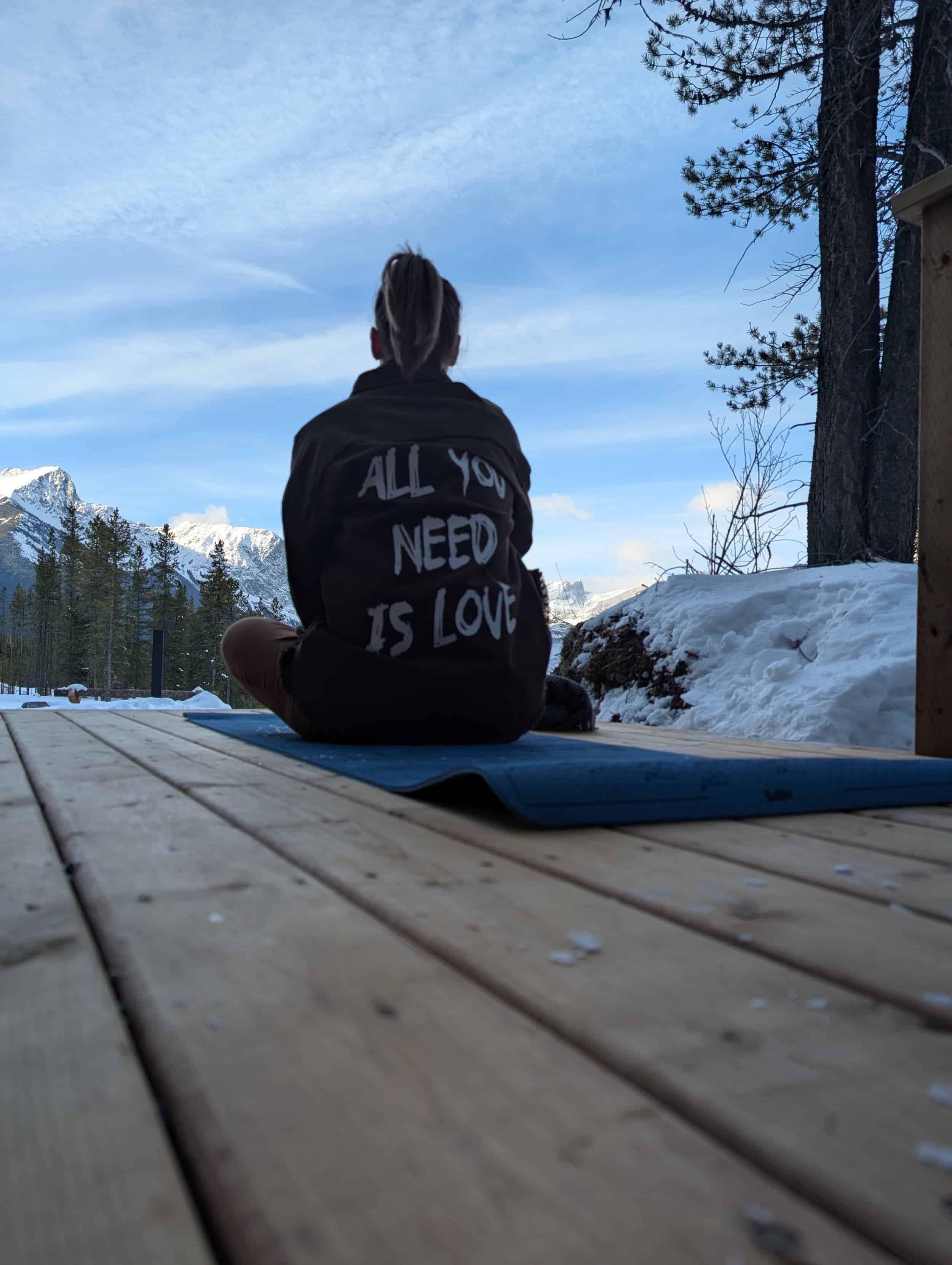 woman doing yoga in the winter