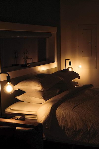 bed at night with lights