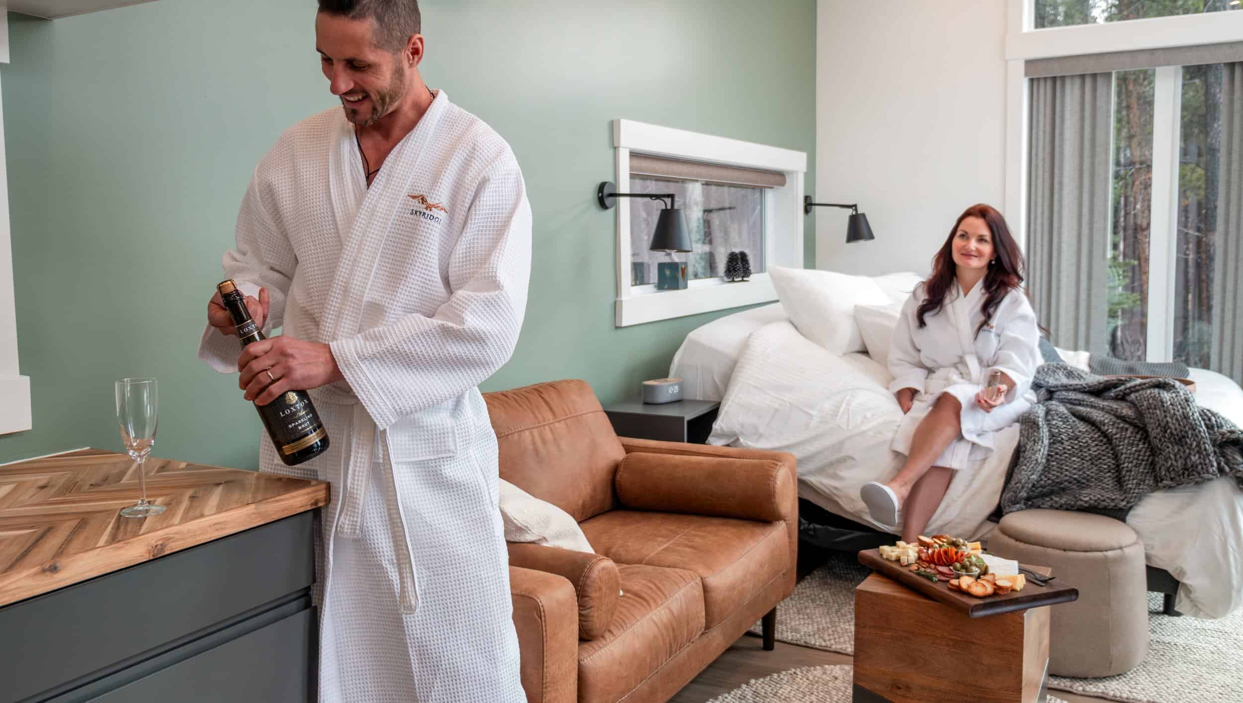 Couple smiling in a skyridge room