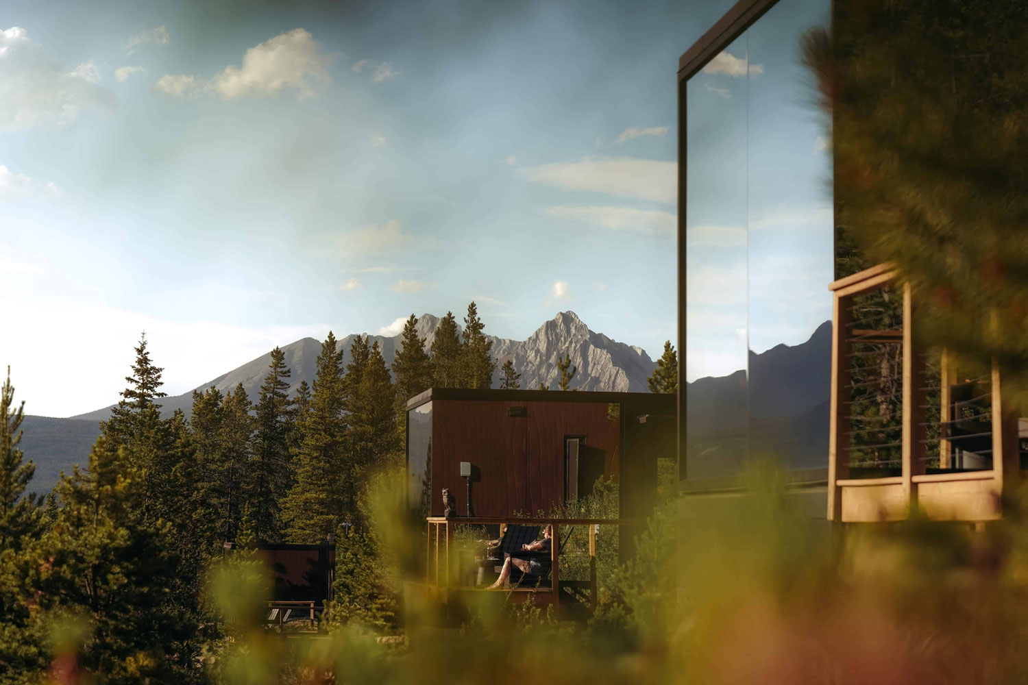 Skyglass cabin mirror window reflection deck mountain