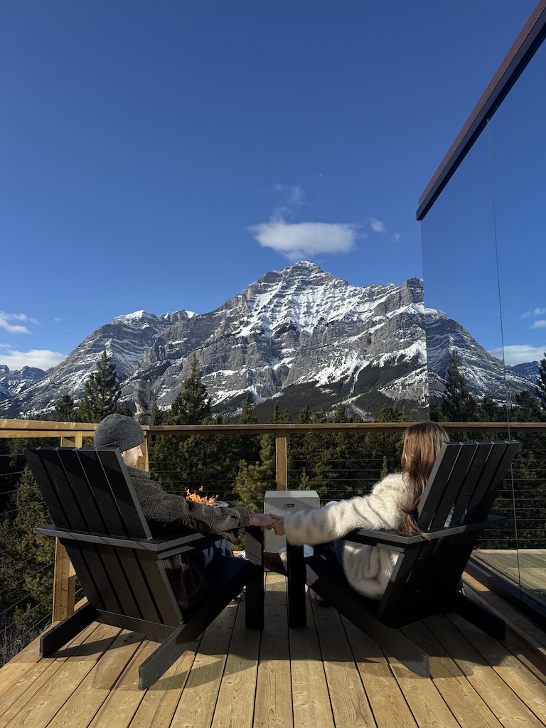 Couple next to a firepit at skyridge