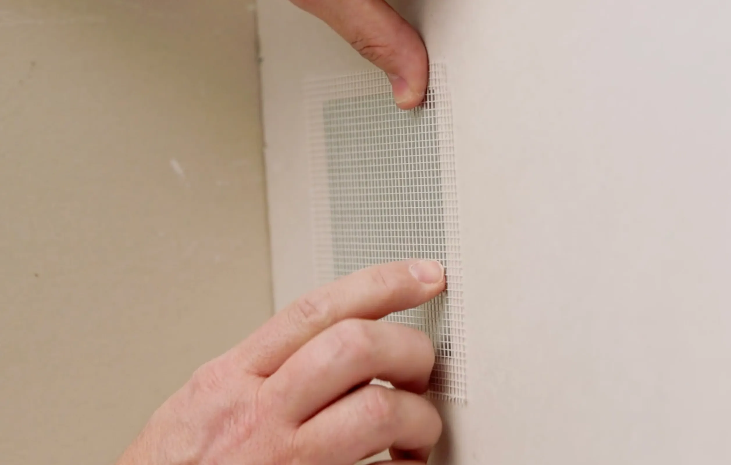 Wall Repair step 2 demonstrating the application process with Gorilla Glue products