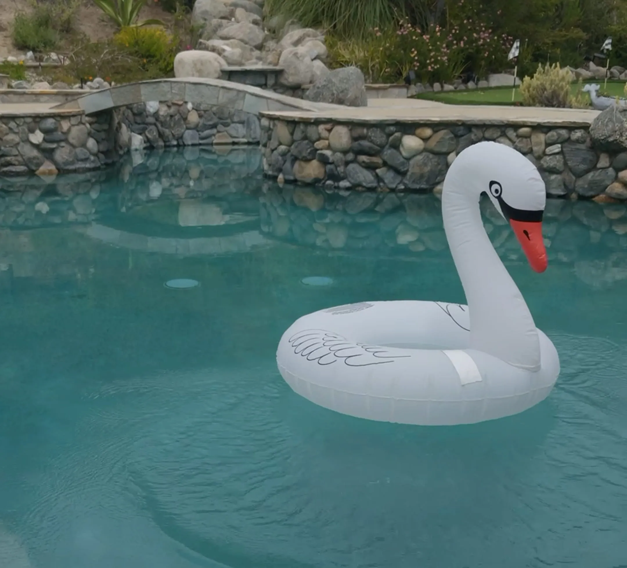 Patched inflatable floating in a pool.