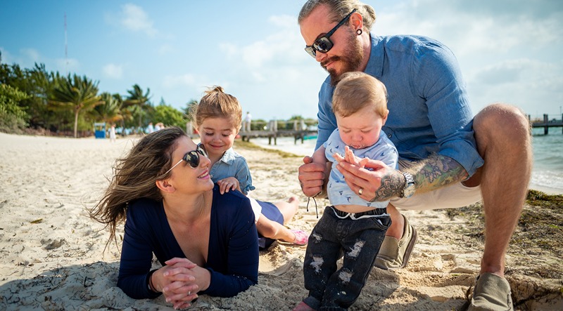 Pamela Garrett relaxing on the beach with family