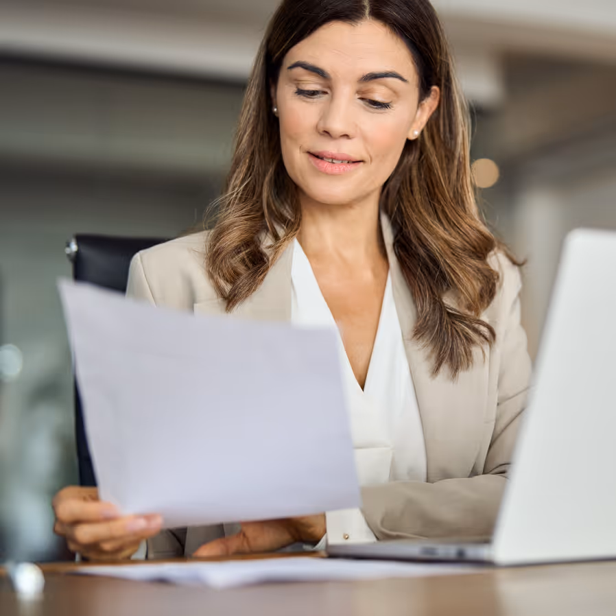 Woman looking at report