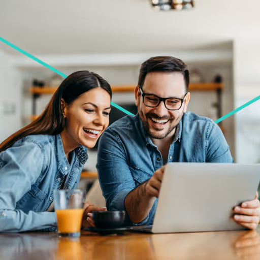 Man and woman looking at laptop