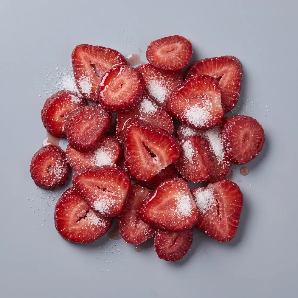 Frozen sliced strawberries with sugar