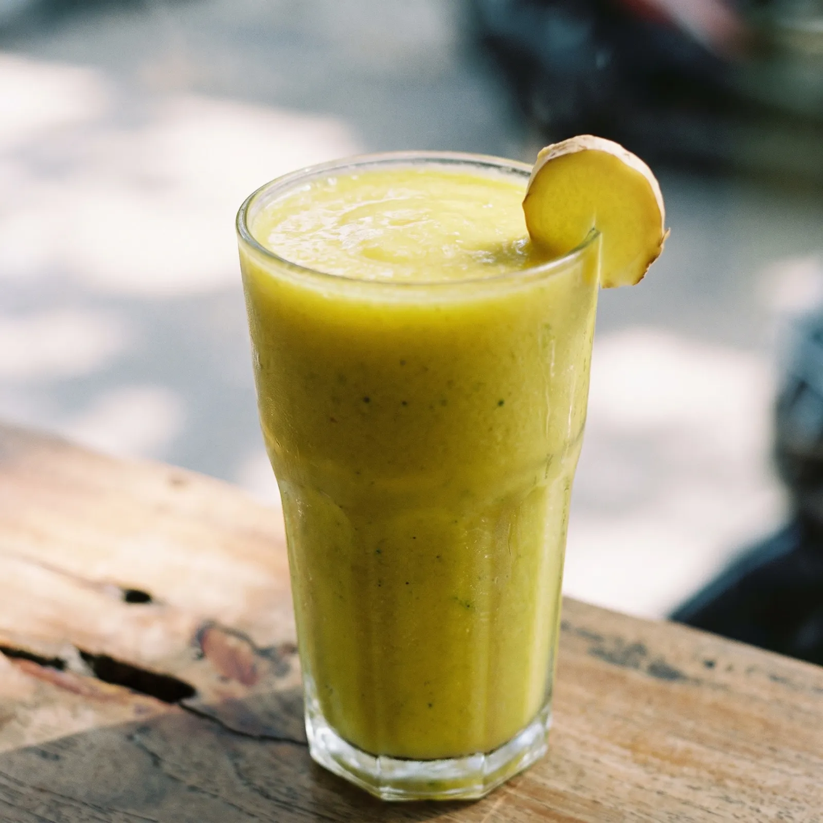Mango ginger green smoothie made with frozen mango