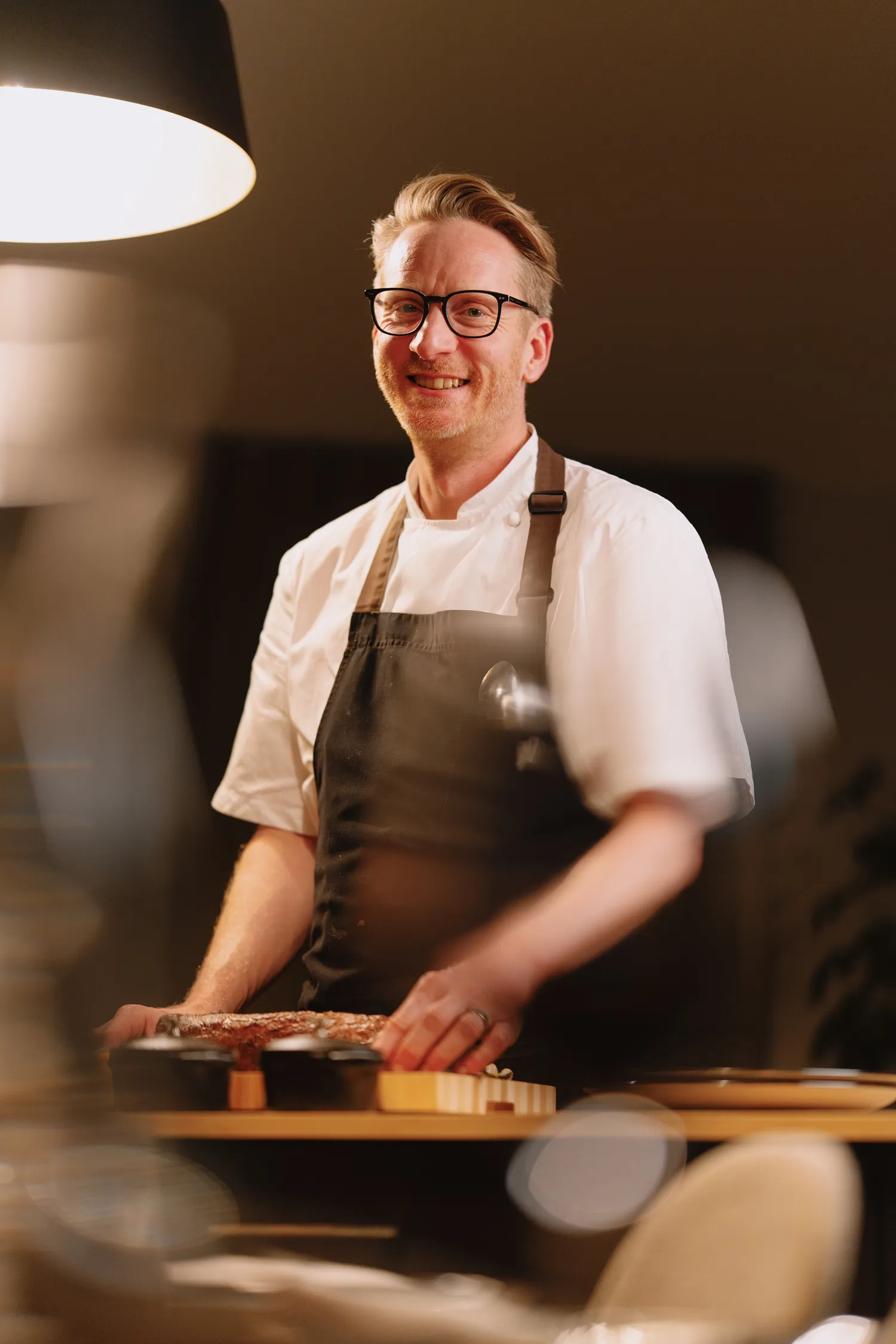 Toby cooking at Domu