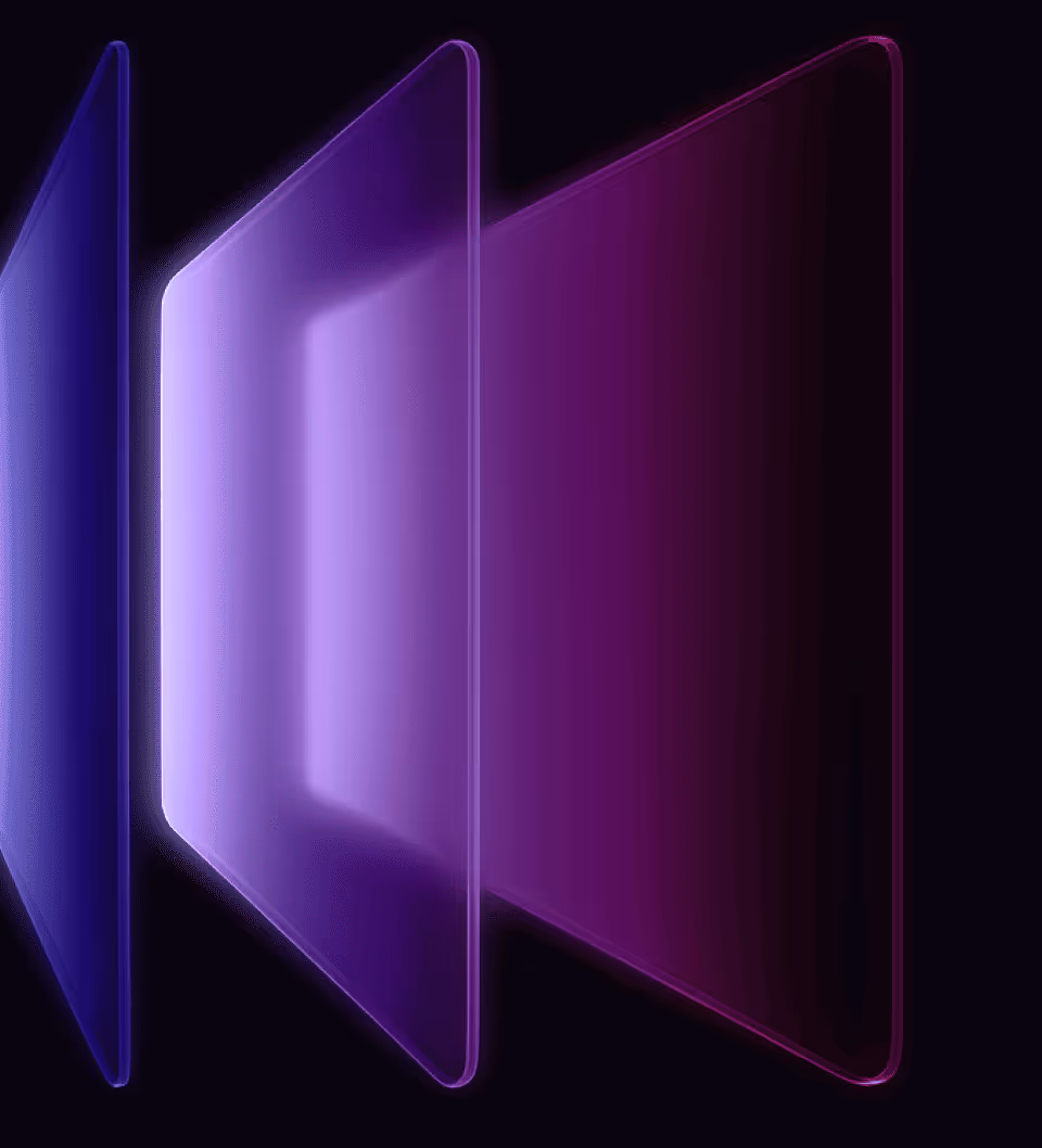3 transparent plastic sheets in pink, purple and blue colors hang in the space