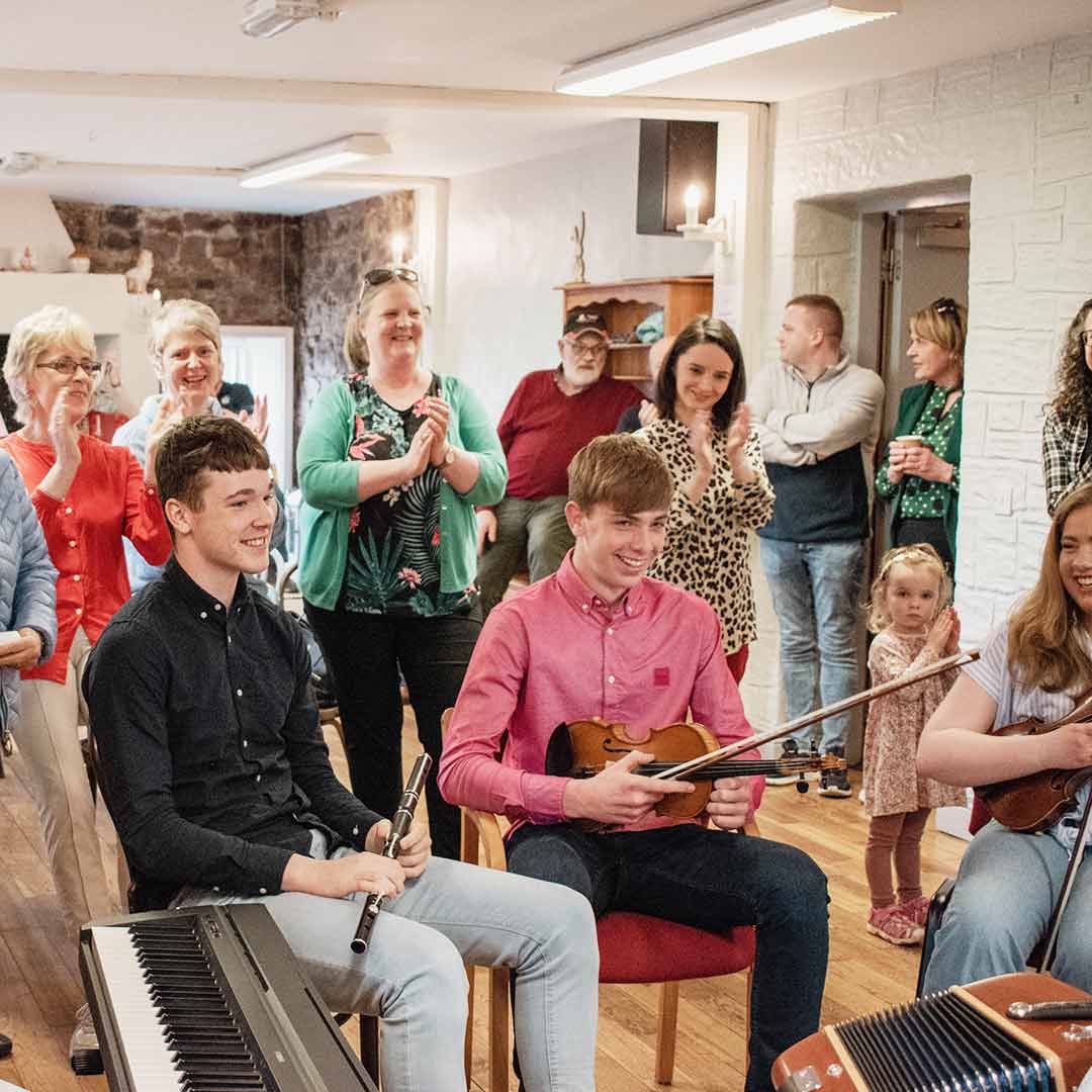 Music being played at a family reunion event at Aras Ide - Roots Shop & Café event space