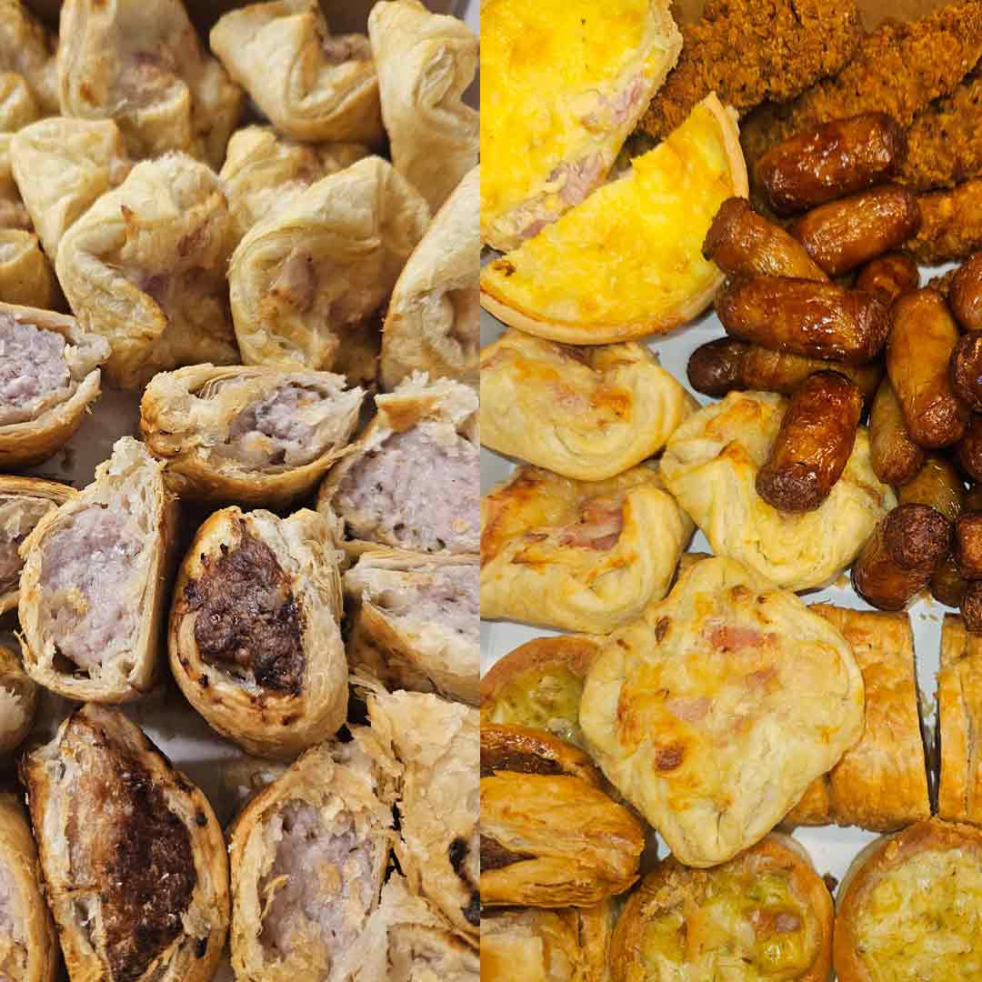 Assortment of various savory finger foods including sausage rolls, mini quiches, and fried sausages.
