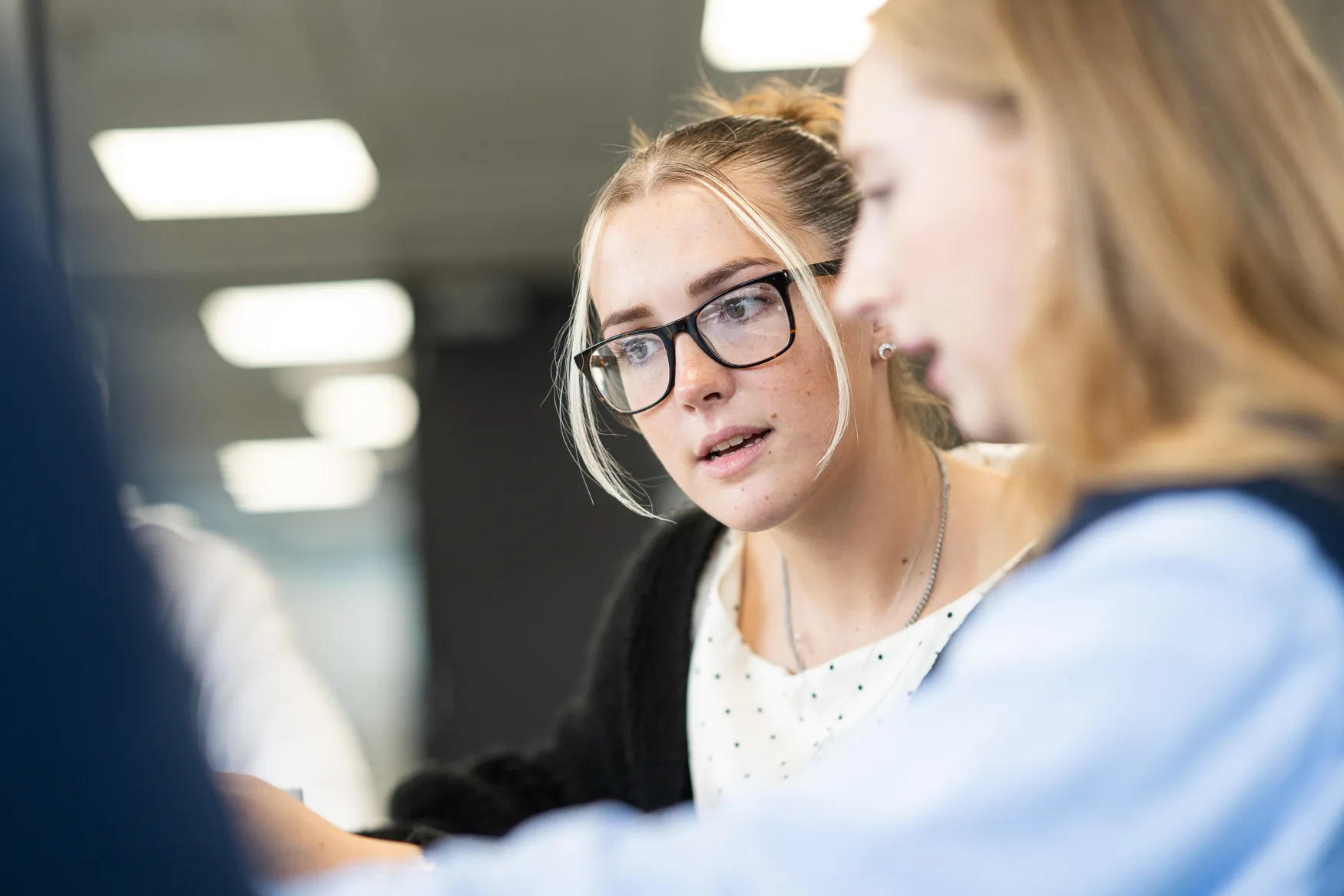 Two Langham Hall employees working