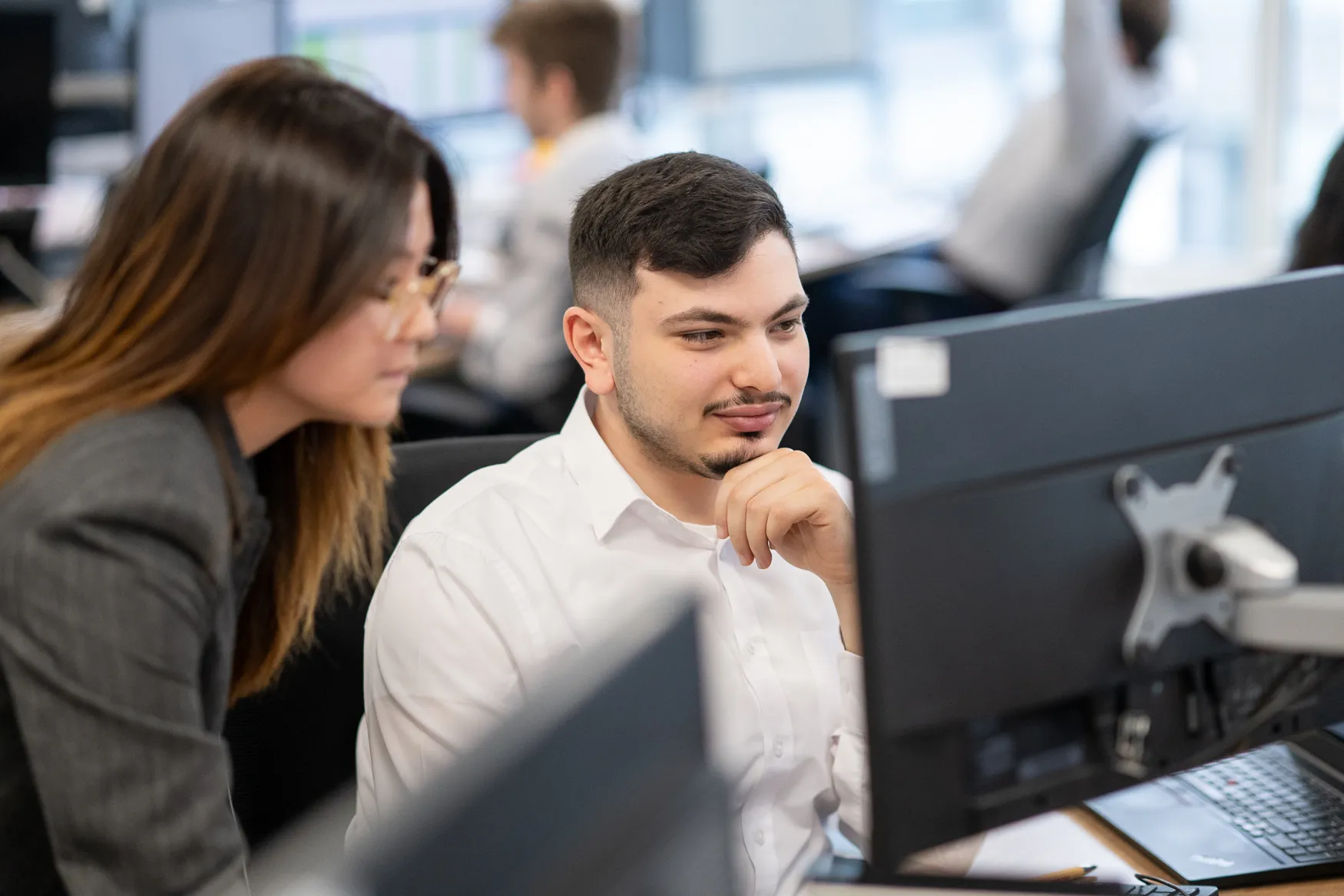 Employees working on the computer