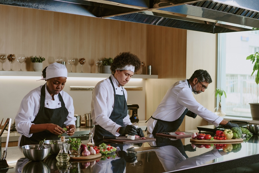 Cooking team working together in a restaurant kitchen