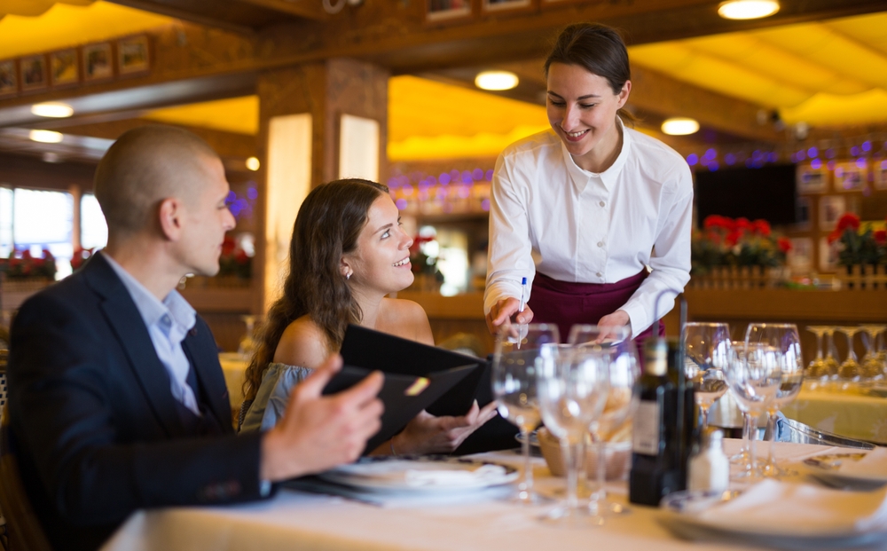 A waitress and customers