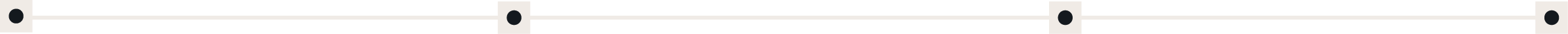 A horizontal dashed line with four equally spaced solid black circles on it.