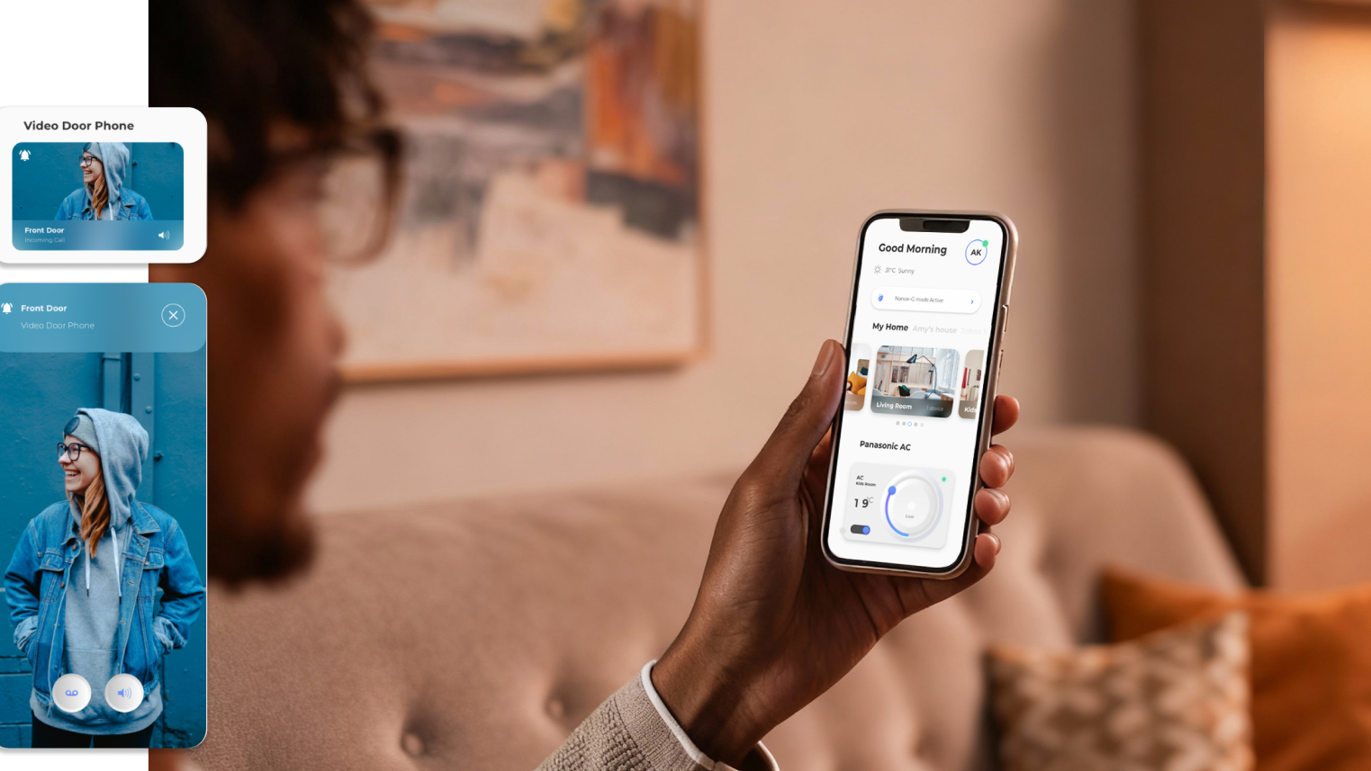 A hand holding a phone running a smart home app
