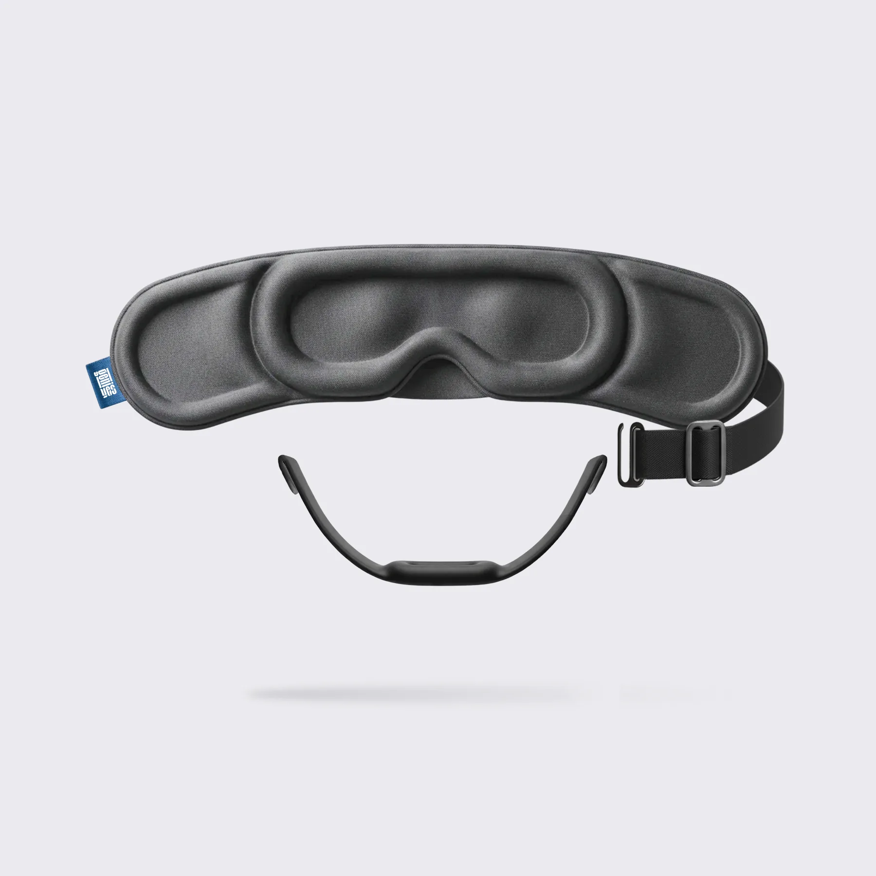 Sleepmaxxer sleep mask shown with its integrated nasal dilator and adjustable chin strap on a clean studio background