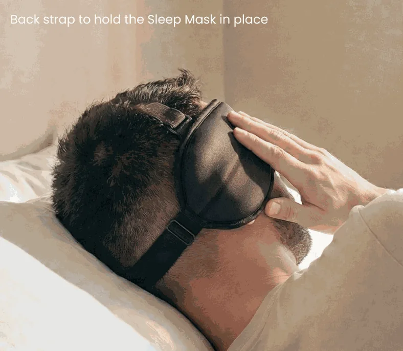 Man resting on his side while wearing the Sleepmaxxer sleep mask, showing its low-profile comfort for side sleepers