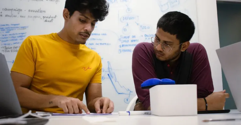 Two Designers Collaborating On Product Prototype