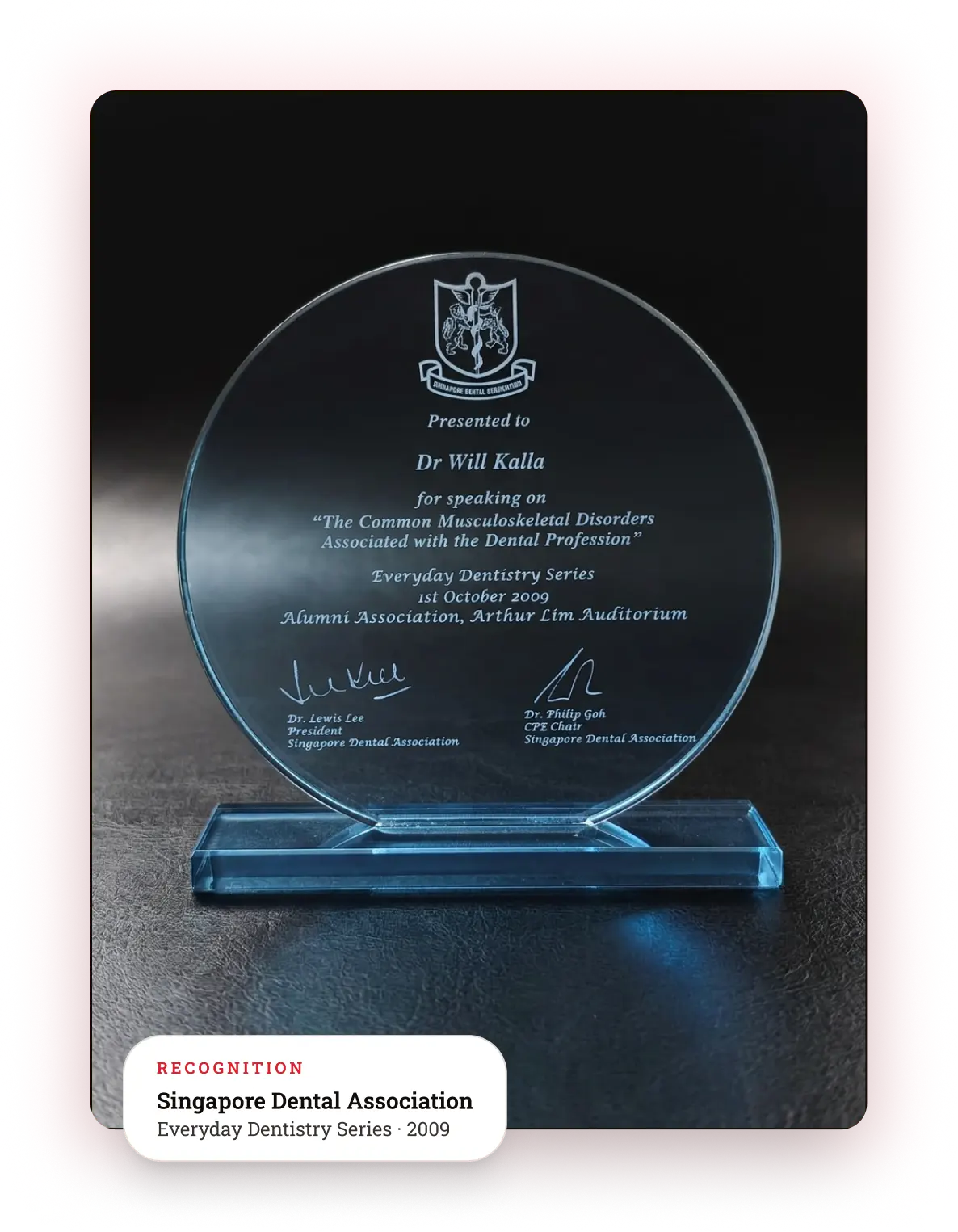 An appreciation award presented to Singapore chiropractor Dr. Will Kalla by the Singapore Dental Association for lecturing on occupational spinal health.