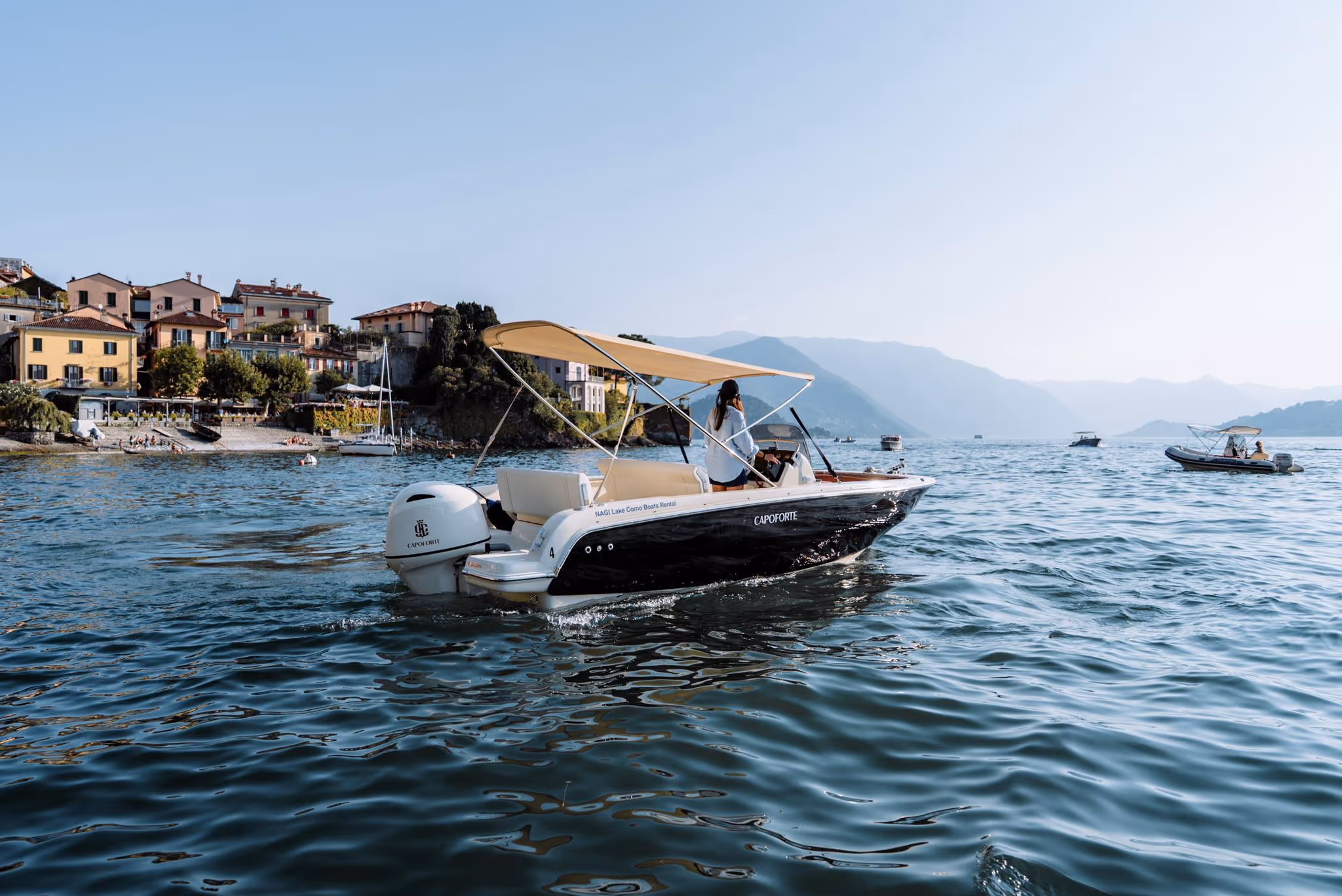 Private and sharing boat tours on lake Como, Italy. Capoforte boat