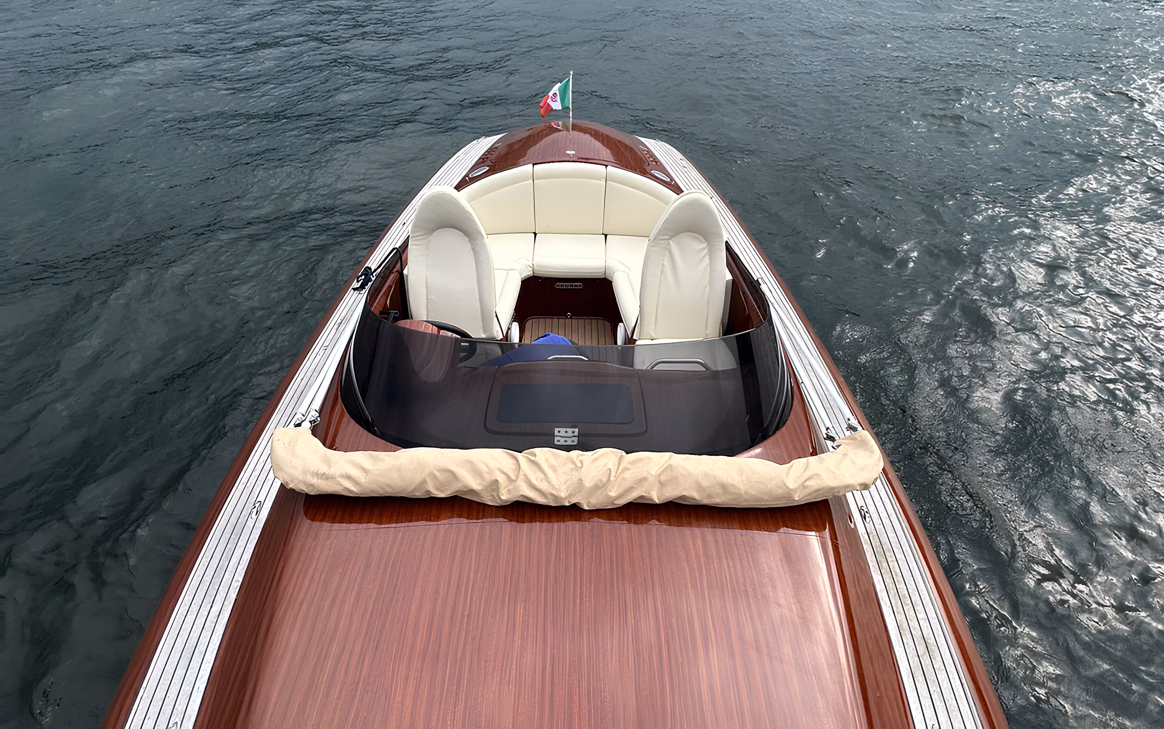 Private and sharing boat tours on lake Como, Italy. Modern style mass boat