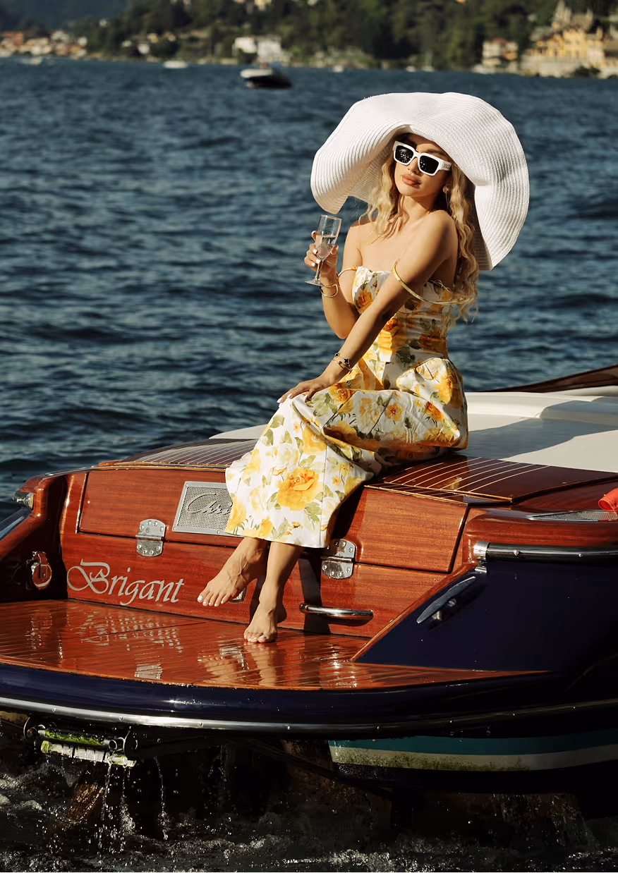 Luxury photoshoot on a wooden boat on Lake Como, Italy