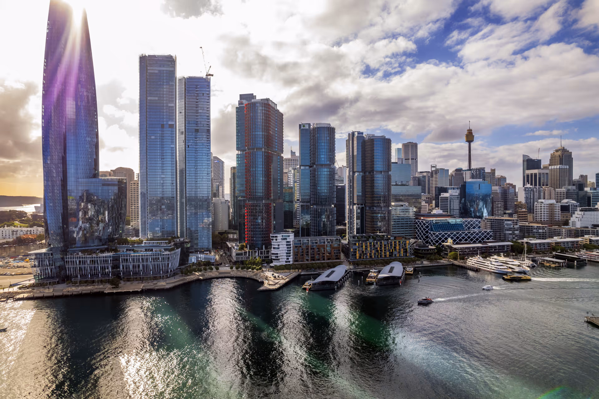 Barangaroo for Sydney sun behind skyscrapers