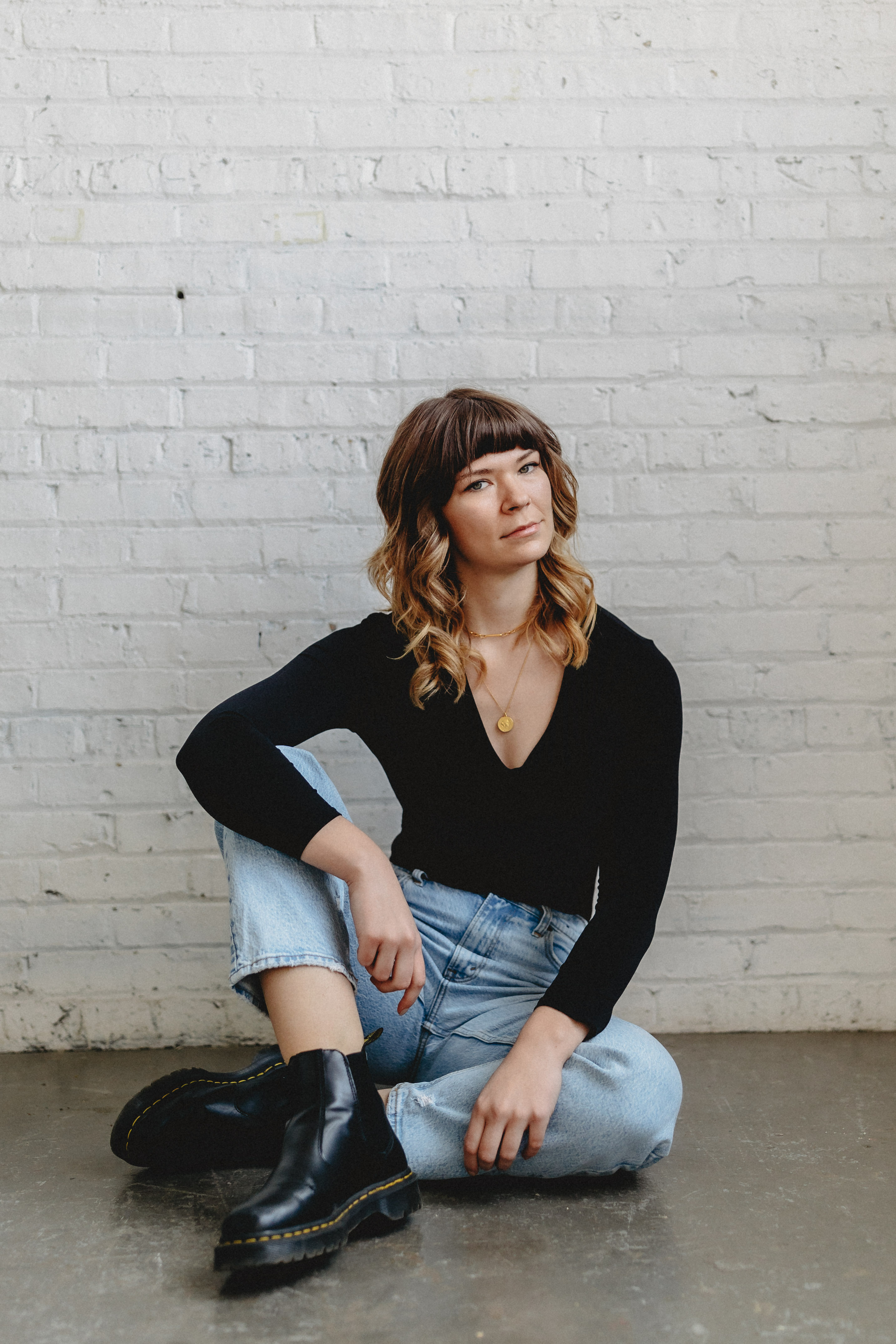 Portrait of massage therapist Sage sitting