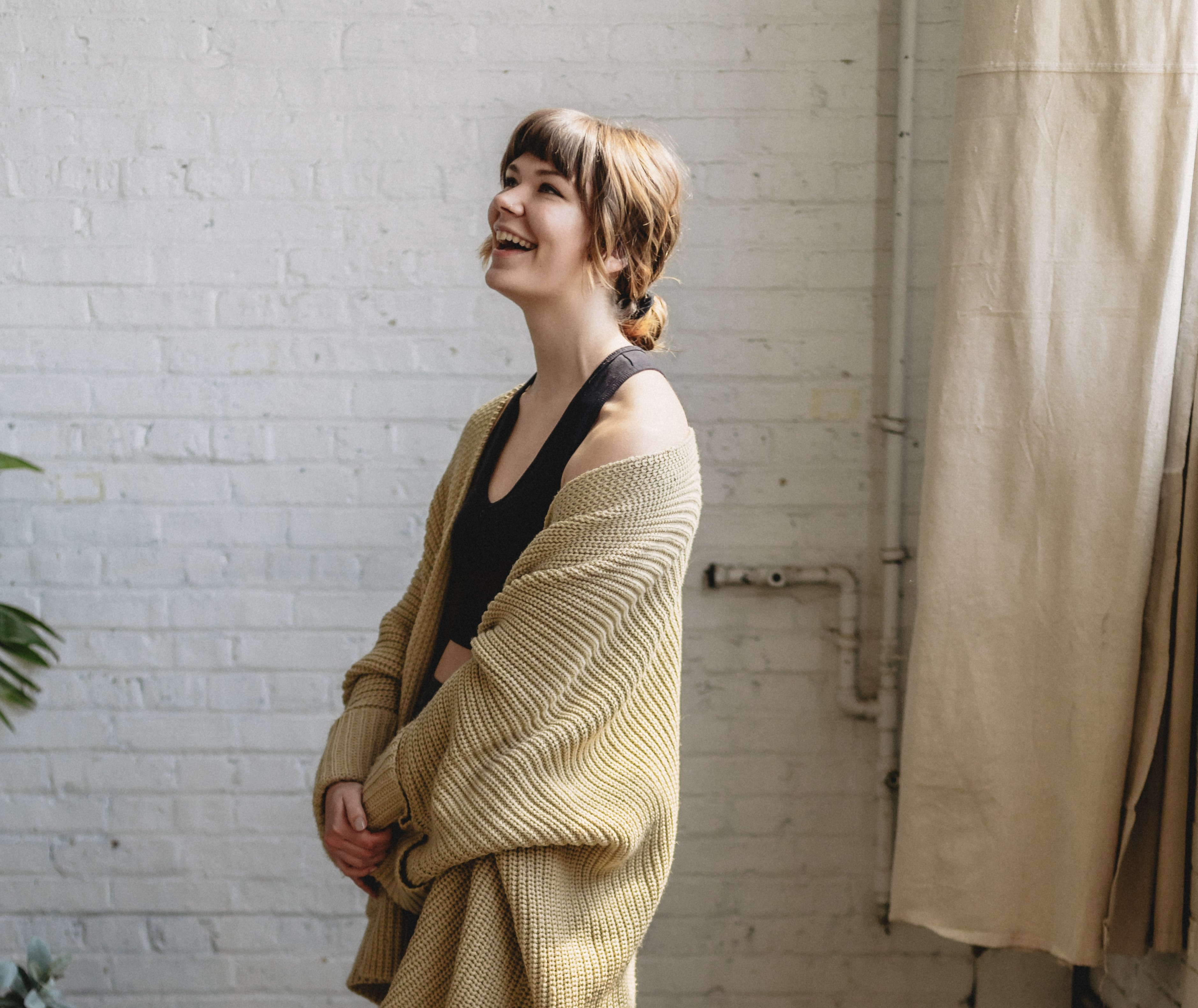 Portrait of massage therapist Sage sitting