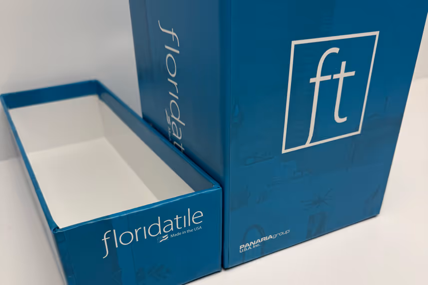 Blue Floridatile sample box with white interior and