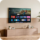 Smart TV on a wall above a wooden cabinet in a modern living room.