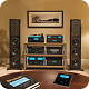 High-end audio system with large speakers and amplifiers in a cozy room.