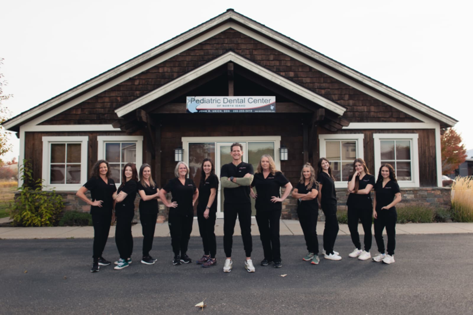 Pediatric Dental Center of North Idaho team standing together outside the practice
