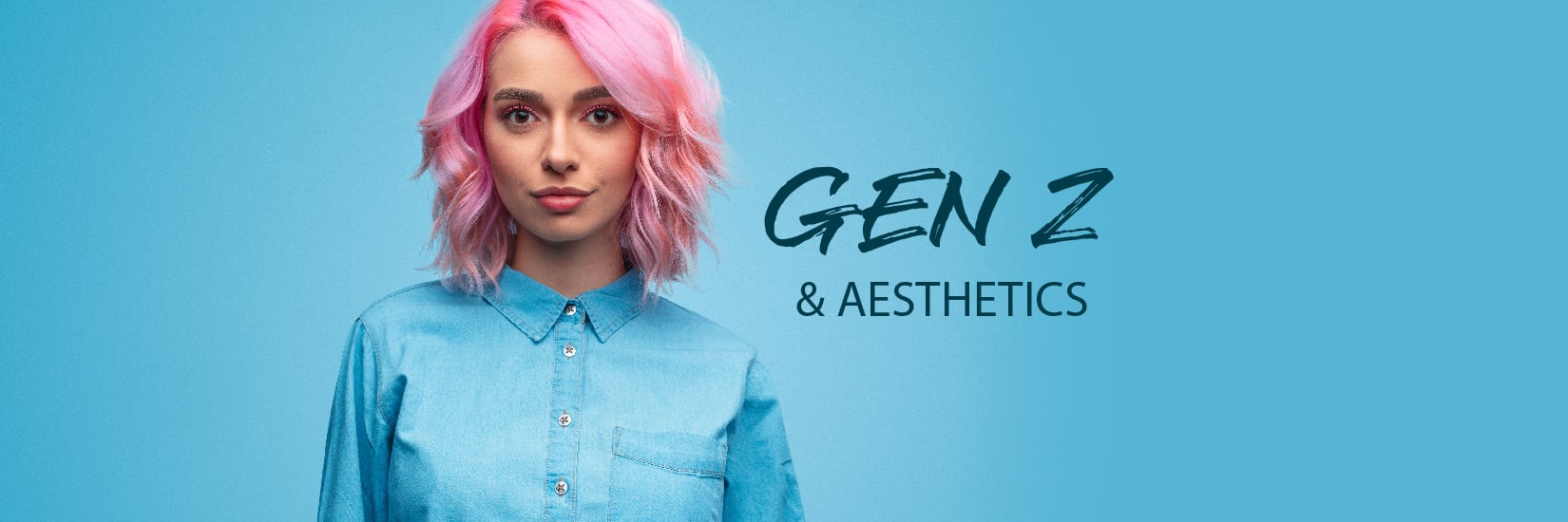 Young woman with pink hair wearing a blue shirt standing against a blue background with text Gen Z & Aesthetics.