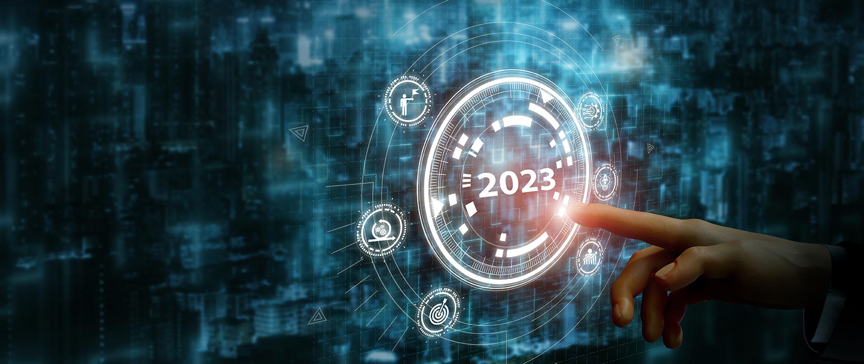 Hand touching glowing digital interface with 2023 in center and technology icons around it.