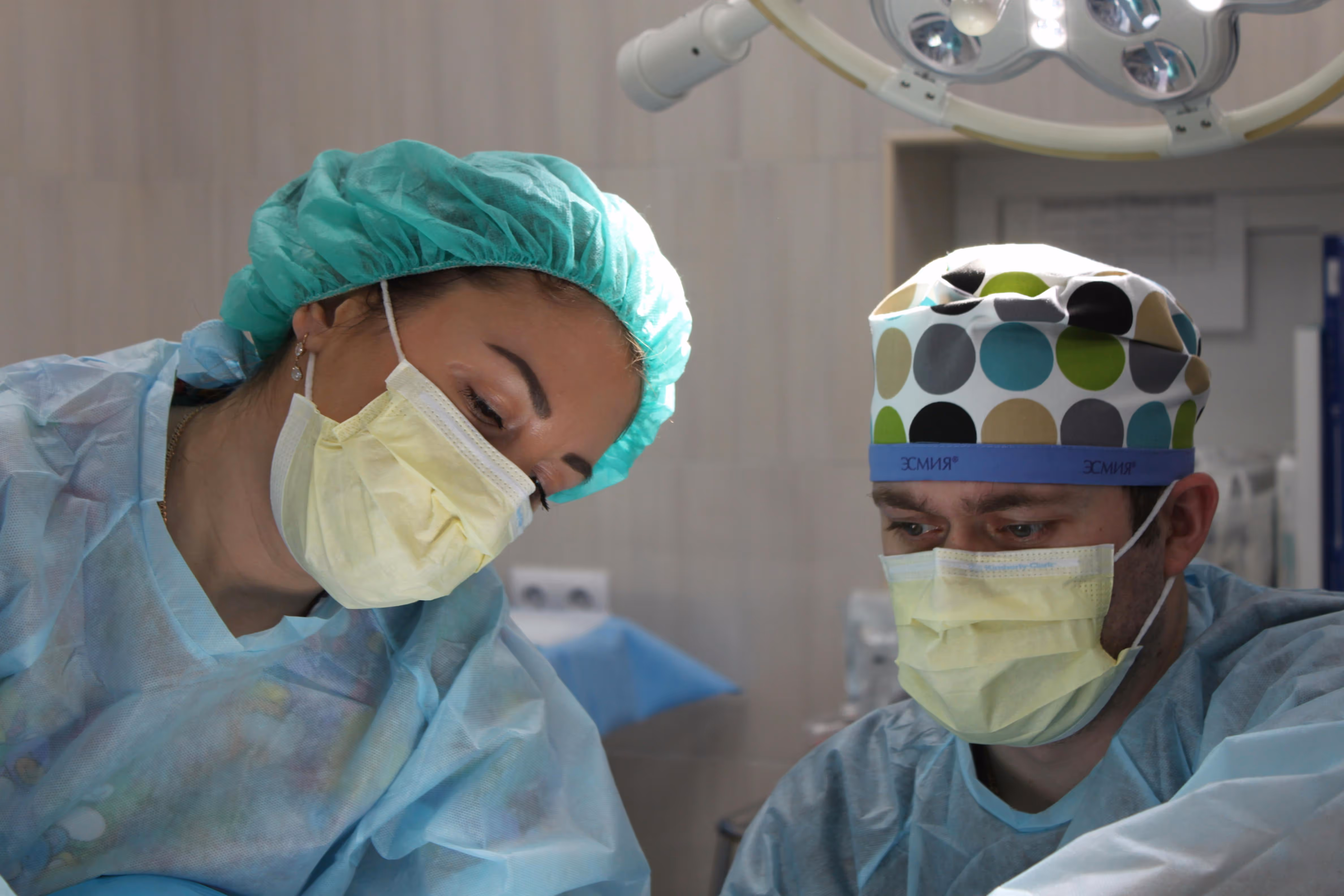 Two doctors performing surgery