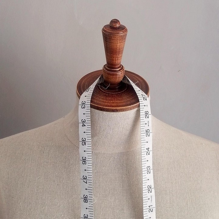 image of clothing racks section (department store)