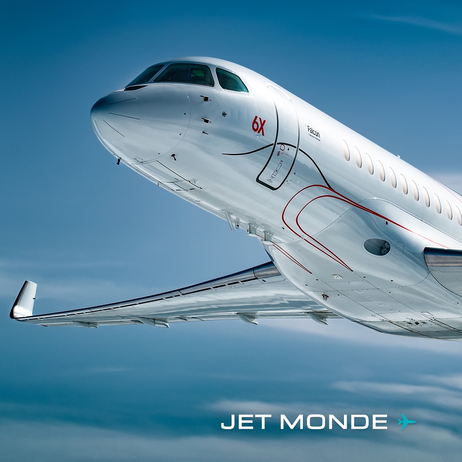 Dassault Falcon 6X business jet in flight illustrating the new standard for long-haul corporate travel.