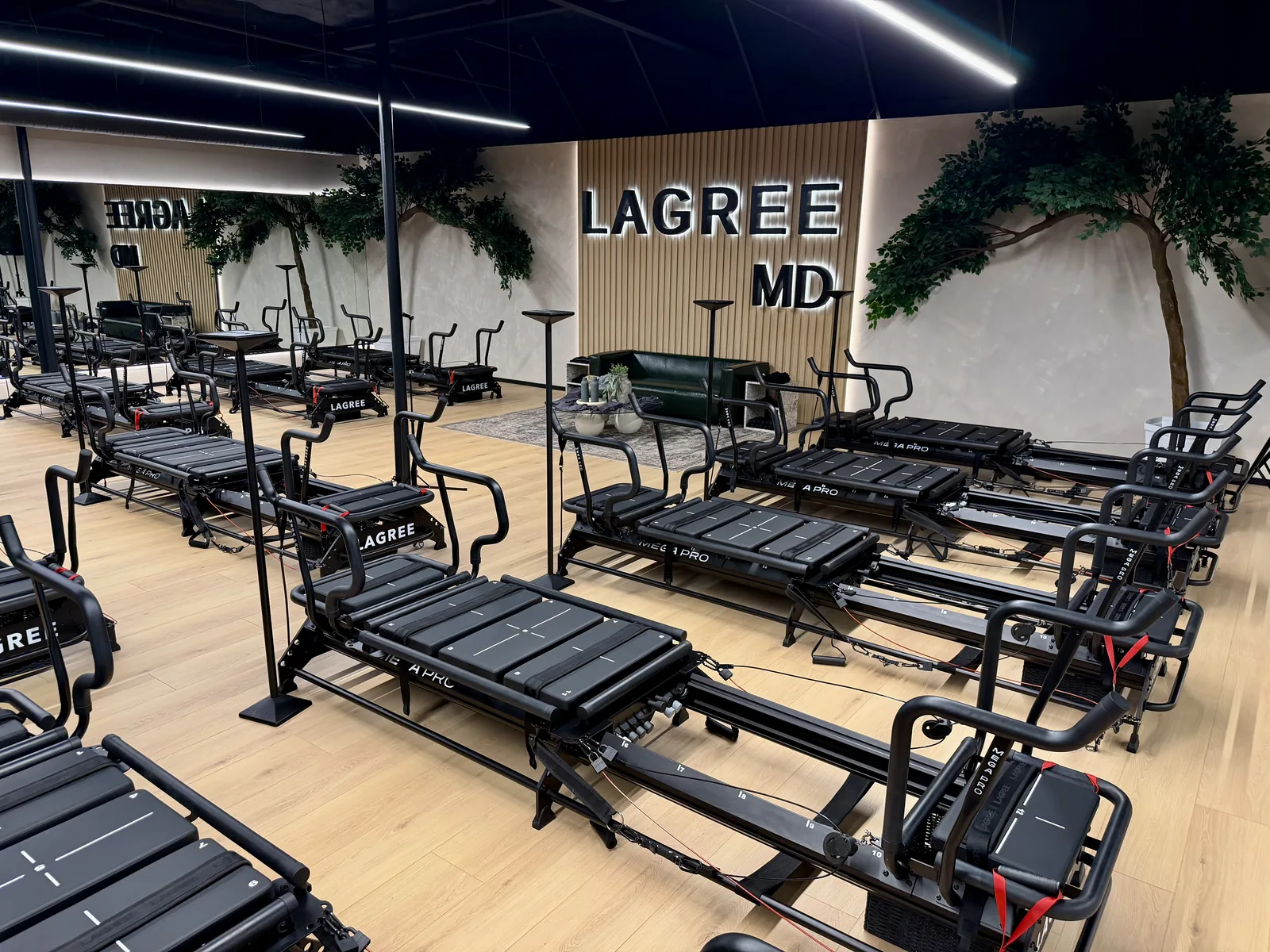 Rows of Megaformer machines in the Lagree MD Costa Mesa studio