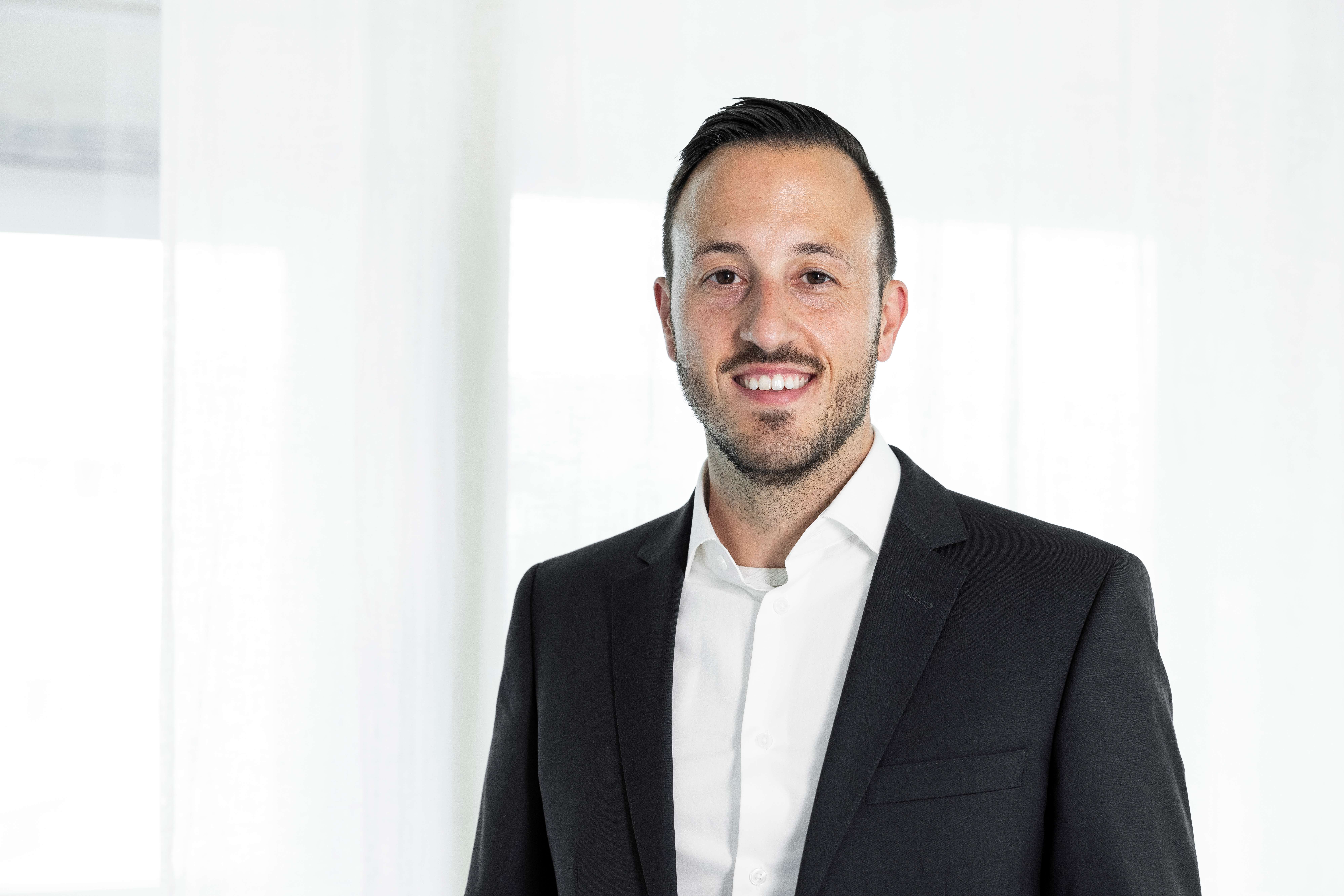 image of students collaborating on a digital project in a technology lab