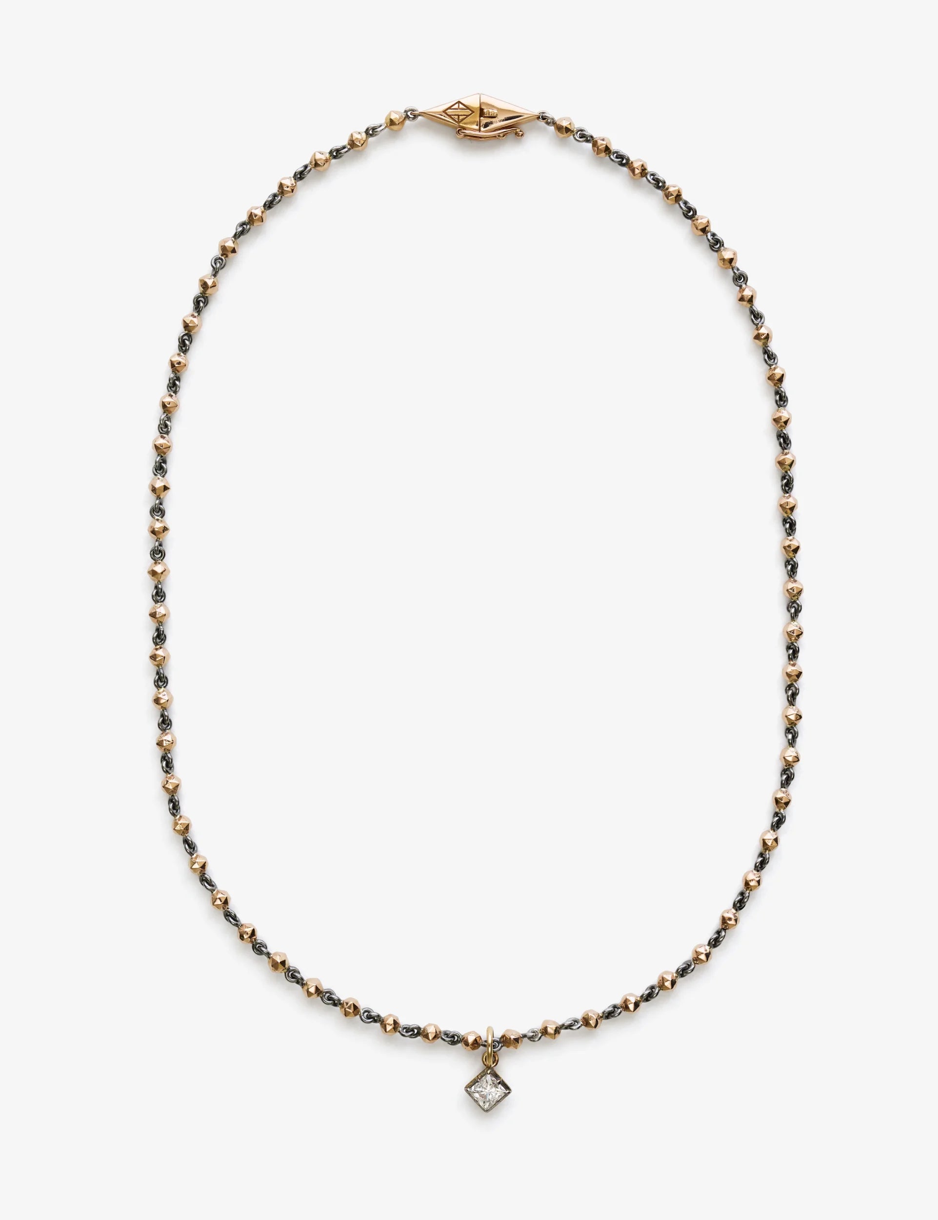 18k rose gold bead necklace featuring a small square diamond pendant, displayed on a white background