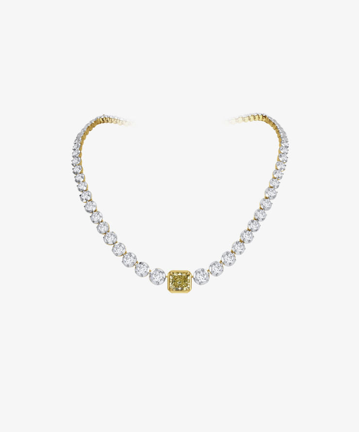 Full view of a gold diamond necklace with a yellow diamond centerpiece and white diamond setting displayed on a white background.