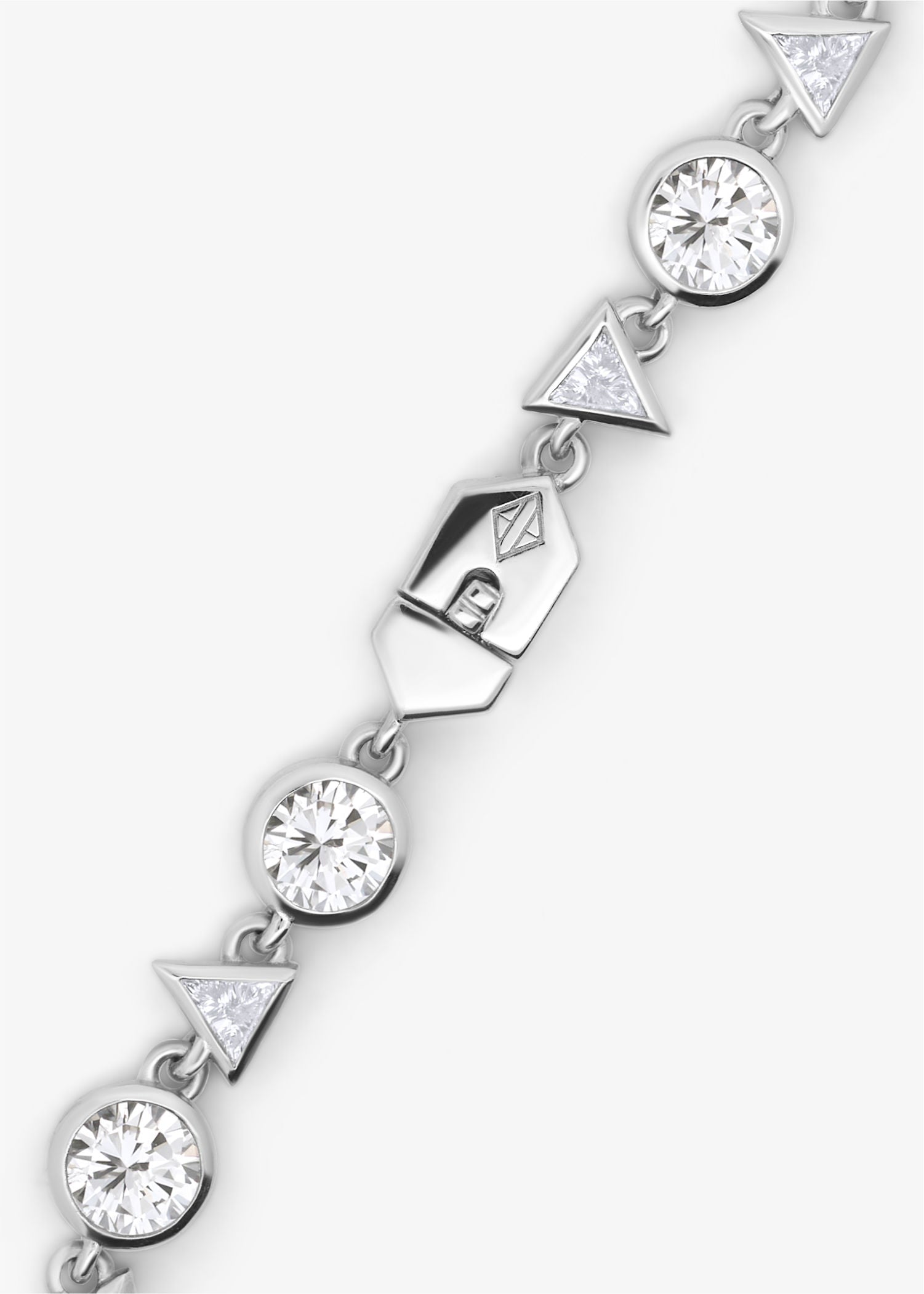 Silver bracelet with diamond-like stones on a white background.